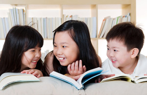 Asian kids reading